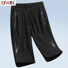 Load image into Gallery viewer, Summer New Joggers Men Shorts Quick Dry Sports Running Shorts Men Fashion Breathable Elastic Waist Board Short Pants Male Bottom
