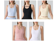 Load image into Gallery viewer, Women's Yoga Fitness Two-Piece Set Removable Padded Sports Bra + Pleated Yoga Skorts with Pockets for Running, Tennis &amp; Workouts
