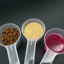 Load image into Gallery viewer, 1pc Transparent Pet Measuring Spoon With Scale Plastic Dog Cat Feeding Shovel Pet Tableware Supplies 50g 100ml
