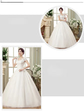 Load image into Gallery viewer, Elegant Lace Ball Gown Wedding Dress
