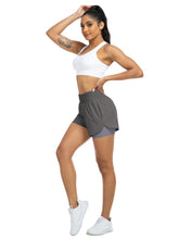 Load image into Gallery viewer, Women's high-waisted athletic shorts for running, yoga, layered design, anti-exposure, fitness, and workout with pockets
