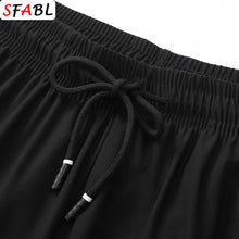 Load image into Gallery viewer, Summer New Joggers Men Shorts Quick Dry Sports Running Shorts Men Fashion Breathable Elastic Waist Board Short Pants Male Bottom
