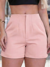 Load image into Gallery viewer, Women's black pleated shorts suitable for all seasons and commuting; side zipper for versatile style.
