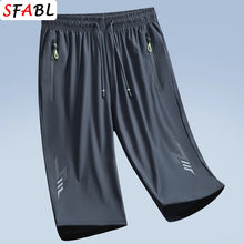 Load image into Gallery viewer, Summer New Joggers Men Shorts Quick Dry Sports Running Shorts Men Fashion Breathable Elastic Waist Board Short Pants Male Bottom
