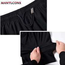 Load image into Gallery viewer, Summer New Joggers Men Shorts Quick Dry Sports Running Shorts Men Fashion Breathable Elastic Waist Board Short Pants Male Bottom
