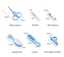 Load image into Gallery viewer, Baby Grooming Kit Baby Care Set BPA Free Cute Design Comb Brush Nail Clippers Scissors Safe Newborn Infant Grooming Tools
