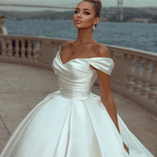 Load image into Gallery viewer, Elegant White Wedding Dresses 2023 Off Shoulder Sweep Train Bride Dress Lace Up Back Satin Wedding Evening Gown Vestido De Novia
