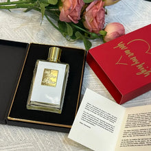 Load image into Gallery viewer, Luxury Unisex Perfume 50ml Floral Chypre Fragrance Peach Rum Rose Cedar Papyrus Long Lasting Elegant Sweet Warm Scent
