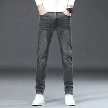 Load image into Gallery viewer, Slim Light Wash Denim Jeans
