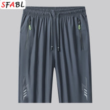 Load image into Gallery viewer, Summer New Joggers Men Shorts Quick Dry Sports Running Shorts Men Fashion Breathable Elastic Waist Board Short Pants Male Bottom
