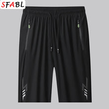 Load image into Gallery viewer, Summer New Joggers Men Shorts Quick Dry Sports Running Shorts Men Fashion Breathable Elastic Waist Board Short Pants Male Bottom
