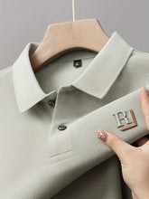 Load image into Gallery viewer, Embossed Alpha Knit Polo
