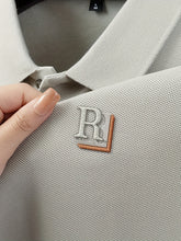 Load image into Gallery viewer, Embossed Alpha Knit Polo
